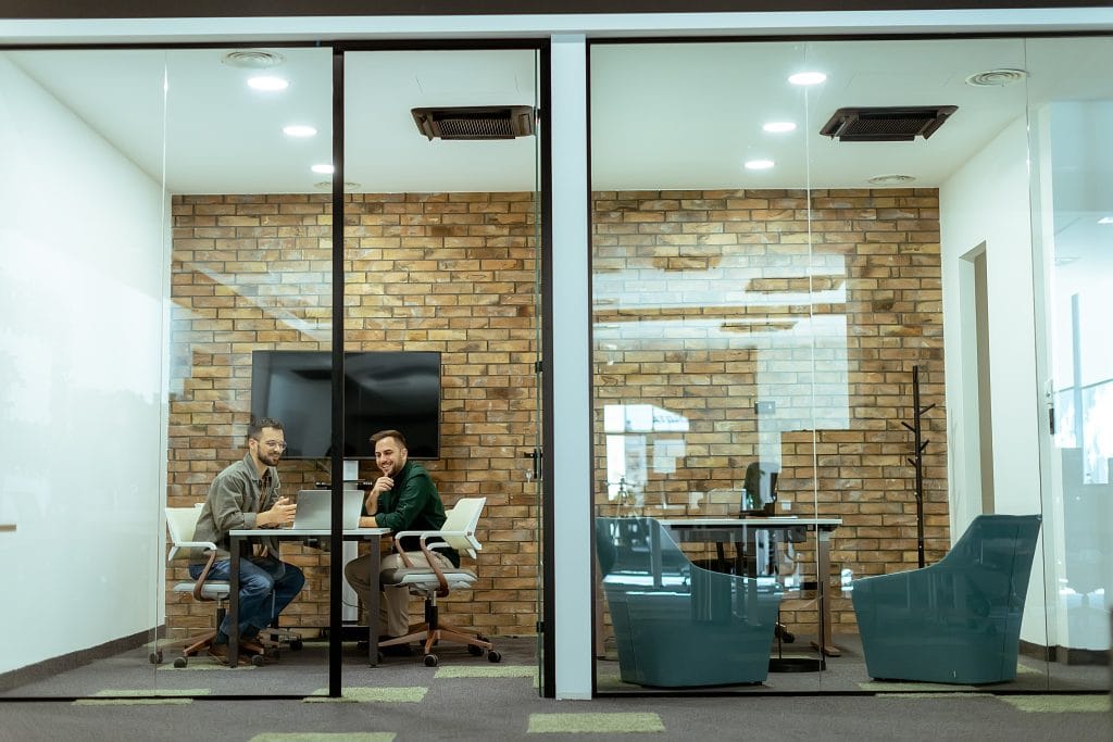 office pod installation with seating and integrated lighting